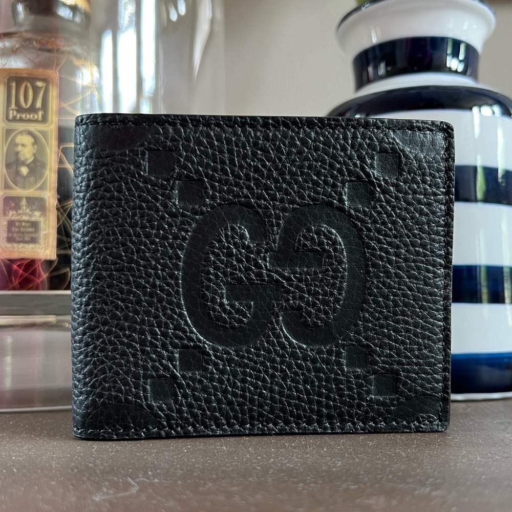 Gucci Embossed Bifold leather Wallet